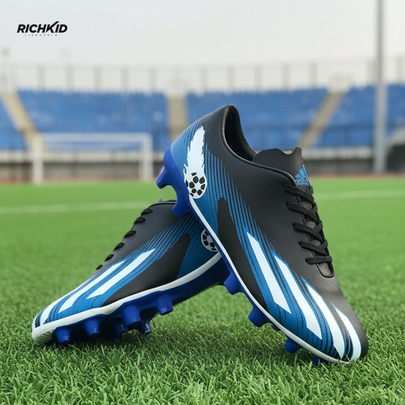 Soccer boot Blue black