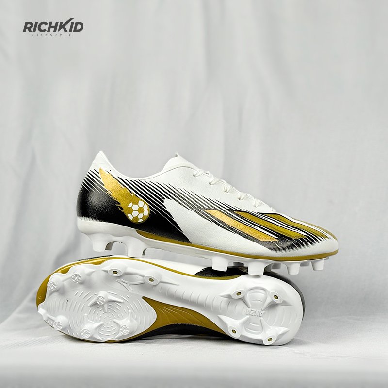 Soccer boot Gold white